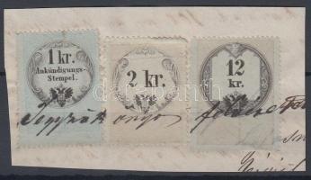 Okmánydarab 2kr + 12kr okmánybélyeggel + 1kr Hirdetménybélyeggel