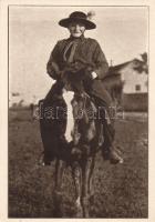 Hungarian boy scout swarm of pony horses