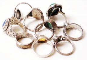 Kilenc darab ezüst (Ag.) gyűrű klf. szintetikus kövekkel, jelzettek, összesen: 47 g