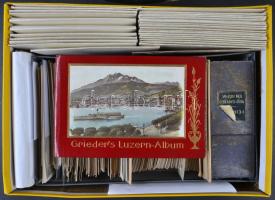 Képeslapgyűjtemény, 1.700-1.800 főleg használatlan képeslap, zömmel európai városképek  kevés magyarral, közte művészlapok, hozzá néhány képes füzet és kisalakú fotók, a múlt század első feléből, 2 nagy cipős dobozban / Postcard collection, 1.700-1.800 mostly unused cards, European city views with some Hungary and art reproduction cards from the first half of the last century, some postcard booklets, leporello booklets, photos, in 2 shoeboxes