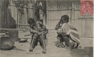 Family from Benin, washing of the baby