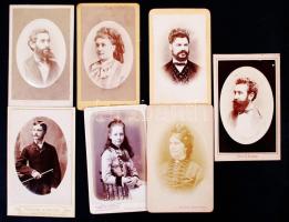 cca 1870-1890 Porcelánkép utánzatú (domborított, fényezett)  vizitkártya portrék bécsi, párizsi, pesti, lippai, aradi, budapesti,  kronstadti műtermekből, 7 db keményhátú fotó, 10x6 cm