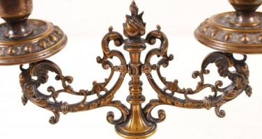 2 db antik kétkarú bronz gyertyatartó, m: 22 cm /
2 bronze candle sitcks