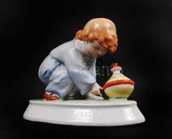 Búgócsigával játszó gyermeket ábrázoló kézzel festett jelzett Zsolnay porcelán figura hibátlan állapotban Sinkó jelzéssel/ Handpainted Zsolnay chinaware figure in flawless condition 13x15cm