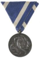 1936. "Ezüst Toldi Miklós-érdemérem" jelzett ezüst kitüntetés eredeti mellszalagon adományozói tokban. "TOLDI MIKLÓS / MAGYAR ERÉNYEKÉRT". Szign.: Zsákodi Csiszér János (0.987/32,5mm) T:2 ph., ütésnyom Hungary 1936. "Silver Miklós Toldi Medal" hallmarked silver decoration on original ribbon in awarding case. Sign.: János Zsákodi Csiszér  (0.987/32,5mm) C:XF edge error, ding NMK 424.