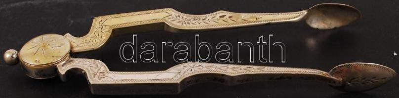 Ezüst (Ag.) cukorfogó, jelzett, apró horpadással, h:15,5 cm, nettó:45,2 g