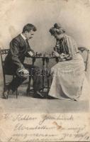 Couple playing chess (EB)