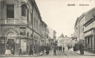 Újvidék, Szűcs utca, gyógyszertár; Hajós tőzsde kiadása / street scene, pharmacy