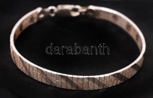 Ezüst (Ag) karkötő két oldalán eltérő díszítéssel, jelzett, h: 18 cm, 11 g / Silver bracelet, 11 g