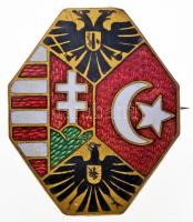 Osztrák-Magyar Monarchia ~1914. Aranyozott, zománcozott fém jelvény osztrák, magyar és török címerrel, hátoldalon "RS OFFIZIELLE KRIEGSFÜSORGE, B.S.& Cie" (24x20mm) T:2 Austro-Hungarian Monarchy ~1914. Gold plated, enamelled metal badge with the coat of arms of Austria, Hungary and Turkey, on the back "RS OFFIZIELLE KRIEGSFÜSORGE, B.S.& Cie" (24x20mm) C:XF