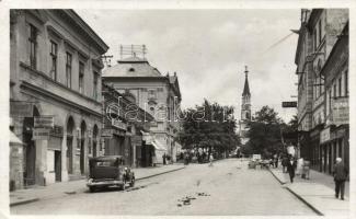 Losonc, Vajanského ulica, utca, Bicskei, Lusztig Lázár és Molnár János boltja, Bé-bi bolt, rőfös, pénztárfiók, autó / street, shops, bank, automobile 'vissza' So. Stpl (EK)