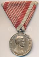 1917. "Károly Arany Vitézségi Érem" aranyozott Br kitüntetés mellszalagon. Szign.: KAUTSCH (31mm) T:2- Hungary 1917. "Gold Medal for Bravery" on wartime ribbon "CAROLVS D.G.IMP.AVST.REX.BOH.ETC.ET REXAPOST.HVNG". Sign.:KAUTSCH (31mm) C:VF