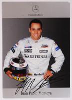 Juan Pablo Montoya Forma-1-es versenyző aláírása az őt ábrázoló nyomtatványon