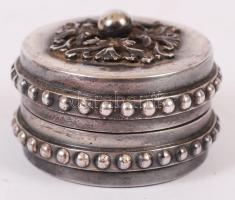 Fém ékdzertartó dobozka, benne két kis kereszttel, d: 4 cm