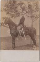 Soldier with horse, photo (fl)