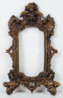 Öntött réz képkeret puttó díszítéssel és növényi motívumokkal, belső: 19x9,5 cm, külső: 33x18 cm