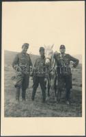 Hungarian soldiers with a white horse photo