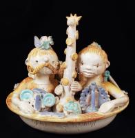 Kovács Éva (1938-): Család az állatkákkal. Kézzel festett mázas kerámia, jelzett, nagyon apró máz hibákkal, m:20 cm, d:25 cm