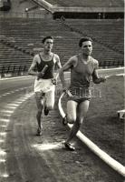 cca 1960 Iharos (Izrael) Sándor (1930-1996) atléta váltó futó versenyen. Elől Beila. Feliratozott vintage sportfotó, 13x9 cm