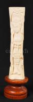Női alakos csont szobrocska fa talapzaton távol-keleti motívumokkal, m: 18,5 cm