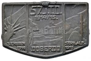 Osztrák-Magyar Monarchia 1914-1915. "57. Gyaloghadosztály 1914-1915" cink sapkajelvény hátoldalon "ENTWURF OBERLTN. BARON CZIBULKA AUSGEF. ATELIER G. GURSCHNER. WIEN VII/2" gyártói jelzéssel (44x31mm) T:2 Austro-Hungarian Monarchy 1914-1915. "57. J.T.D. 1914/15 (57th Infantry TrooP Division) - SERBIEN 1914 - DOBERDO - SERB.ALB. 1915" zinc cap badge with makers mark "ENTWURF OBERLTN. BARON CZIBULKA AUSGEF. ATELIER G. GURSCHNER. WIEN VII/2" (44x31mm) C:XF