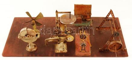 cca 1940 Transzmissziós szerszámgépek gyerekeknek, fa lemezre erősítve, rozsdás hiányos állapotban, 31×57 cm