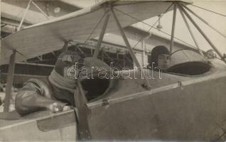 Pilots in airplane, photo