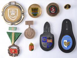 9db vegyes magyar és külföldi kitüntetés, jelvény és emlékérem, benne "KFOR", "Magyar Honvédség Dr. Radó György Honvéd Egészségügyi Központ", "Szt. László Herma Győr" stb. T:vegyes