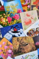 110 db MODERN vegyes képeslap pár nagyméretű lappal és egy nagyméretű nagyítóval; többnyire üdvözlő lapok (karácsony, húsvét, újév) / 110 modern mixed postcards with some big sized cards and a big sized Magnifying glass; mostly greeting cards (Christmas, Easter, New Year)