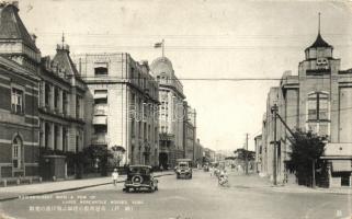 Kobe, Kaigan Street with a pow of large Mercantile house, automobile (EK)