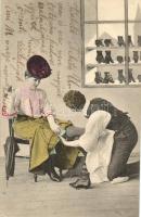 In the shoe shop, lady with the salesman, naughty humorous erotic postcard (Rb)