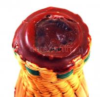 Egy üveg bontatlan kajszibarack pálinka (cca 1 l), díszes, fonott gyékény védőtokban, szélein kicsit...