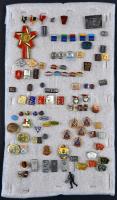 ~100db vegyes magyar és külföldi szocialista jelvény tablóra tűzve, közte "KISZ", olimpiai jelvények T:vegyes