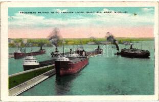 Sault Ste. Marie, freighters waiting to go  &lt;br/&gt;through locks