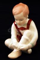 Aquincumi porcelán kisfiú, kézzel festett, jelzett, apró kopásnyomokkal, m: 11 cm
