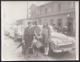 cca 1960 Közért, tejívó, taxi, 2 db fotó, 12x9 cm