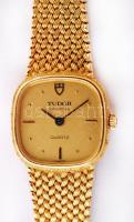 cca 1980 Tudor márkájú (Rolex) 14 karátos női arany karóra, arany szíjjal, jelzett felhúzókoronával,...