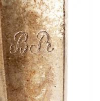 Ezüst (Ag.) nyelű villa és kés, két különböző monogrammal, megviselt állapotban, jelzett, br. 185 g