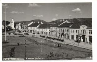 Gyergyószentmiklós, Kossuth Lajos tér, Szilágyi Szálloda, Moskovits Mendel vegyeskereskedése, Lázár Dénes üzlete, Zárug L. István üzlete, Idegenforgalmi iroda / square, hotel, shops