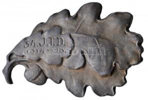 Osztrák-Magyar Monarchia 1916. "34. Gyaloghadosztály 1914-16." cink sapkajelvény hátoldalon "ATELIER GURSCHNER WIEN LINDENGASSE 9." gyártói jelzéssel(37x25mm) T:2 Austro-Hungarian Monarchy 1916. "34. J.T.D. (Infantry Troop Division) 1914-16." zinc cap badge on the back with makers mark "ATELIER GURSCHNER WIEN LINDENGASSE 9." (37x25mm) C:XF