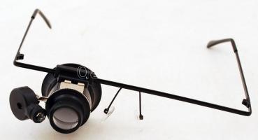 20-szoros nagyítású szemüveg lupé, állítható LED-es lámpával, műanyag tokban, működik