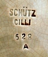 Schütz Cilli: Erdőn játszadozó faun és puttó, mázas kerámia dísz falitányér, jelzett, mázhibával, há...