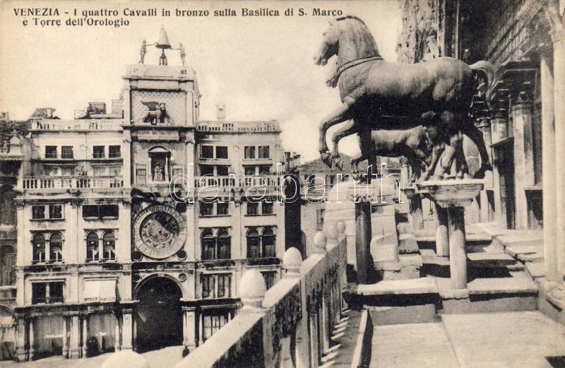Venice, Venezia; The four bronze horses of St. Mark's Basilica and the Clock Tower